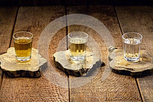 Cups of cachaÃ§a, a Brazilian drink made from sugar cane, a Brazilian run popularly called