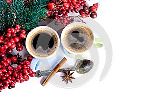 Cups of fragrant coffee on a Christmas background