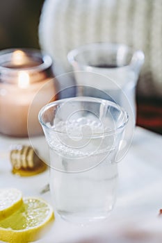 Cups of lemon and cinnamon tea in a cozy atmosphere at home