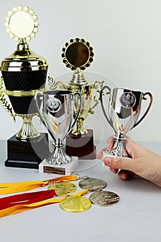 cups and medals for awarding the winners. Sports, competitions.