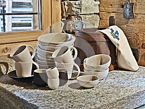 Cups and plate on the worktop in the kitchen