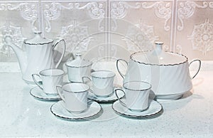 Cups of tea with a teapot