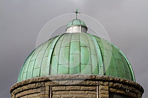 Cupula green dome, copper with Verdigris, gloomy sky photo