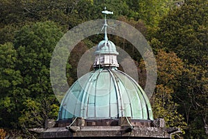 Cupula green dome, copper with Verdigris, gloomy sky photo