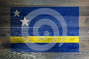 Curacao flag on rustic old wood surface background