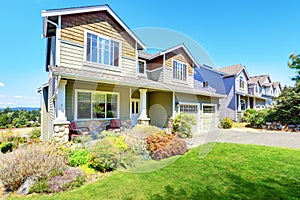 Curb appeal of luxury family house with nice landscape.