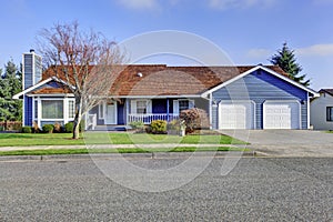 Curb appeal one level American house with blue and white trim