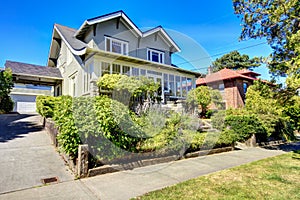 Curb appeal. Two story house with garage and driveway