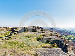 Curbar Edge in the Derbyshire Peak District on a bright, hazy spring day