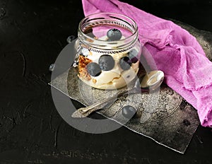 Curd dessert jar. Summer village breakfast. Cottage cheese with blueberries.