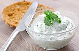 Curd with herb and bread photo