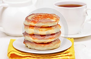 Curd pancakes stack and tea