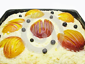 Curd pudding cake with peaches