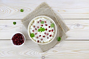 Curd rice in a bowl. A popular dish from South India with rice, yogurt, spices and pomegranate