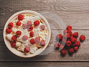 Curd with ripe fresh raspberries