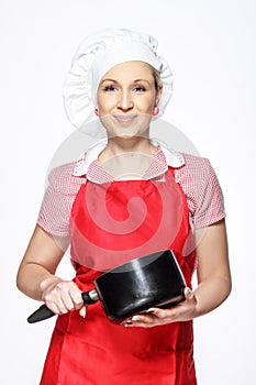 Cure female chef posing with saucepan