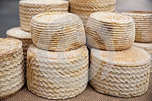 Cured artisan cheeses from bovine animals