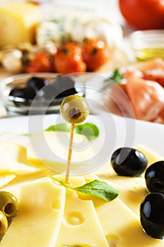 Cured cheese with olives