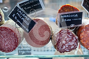 Cured sausages at a market stall
