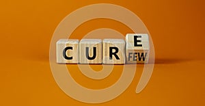 Curfew and cure symbol. Turned a cube and changed the word `curfew` to `cure`. Beautiful orange background. Business, curfew a