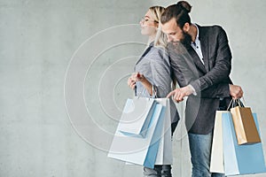 Curiosity buy addict man interested shopping bags