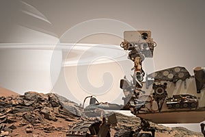 Curiosity Mars Rover exploring the surface of red planet. photo