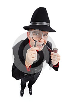 Curious detective looking through magnifier