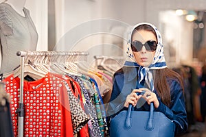 Curious Girl in Blue Trench Coat and Sunglasses Shopping