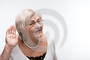 Curious granny trying to hear something