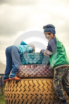 Curious kids looking into hole concept curiosity