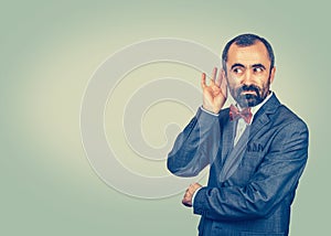 Curious man listening to conversation news eavesdropping