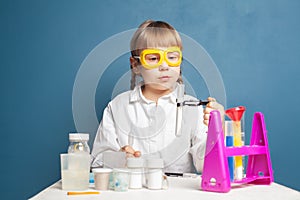 Curious student girl learning science. Child learning science