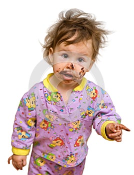 Curious toddler with chocolate dirty face