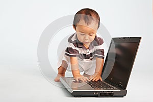 Curious Toddler with Laptop