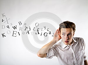 Curious young man in white. Curious man and letters. Information concept