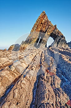 The curiously shaped Blackchurch Rock, Hartland peninsular, Devon.