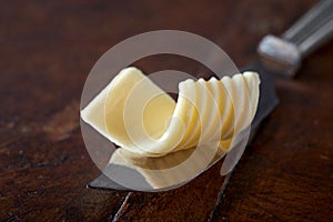 Curl of butter on a vintage butter knife