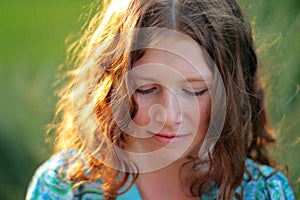 Curl cute girl in sunlight