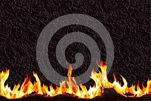 Curled edge of a black abstract background and scorched and curled on a black background. Blazing flames. Fire. Concept for your