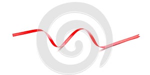 Curled red ribbon on white background
