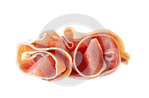 Curled Slices of Delicious Prosciutto isolated on white background