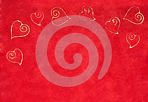 Curlicue hearts on a red background