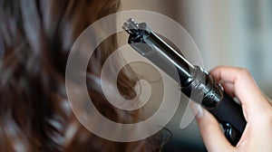 The curling iron also has a cool tip at the end of the barrel making it easier to handle while curling photo