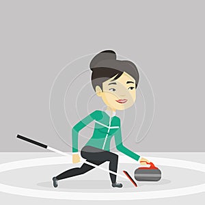 Curling player playing curling on curling rink.