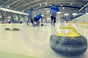 Curling stone on a game sheet.