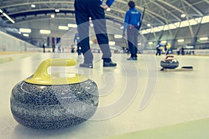 Curling stone on a game sheet.