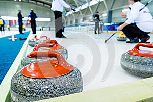 Curling stone on a game sheet.