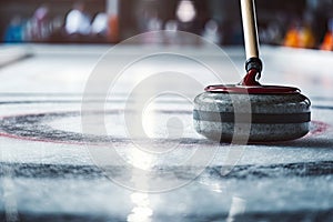 curling stones on ice