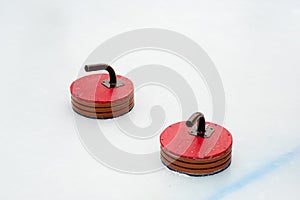 Curling stones on the ice