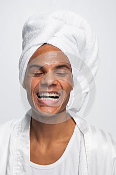 Curly African-American smile  on white photo